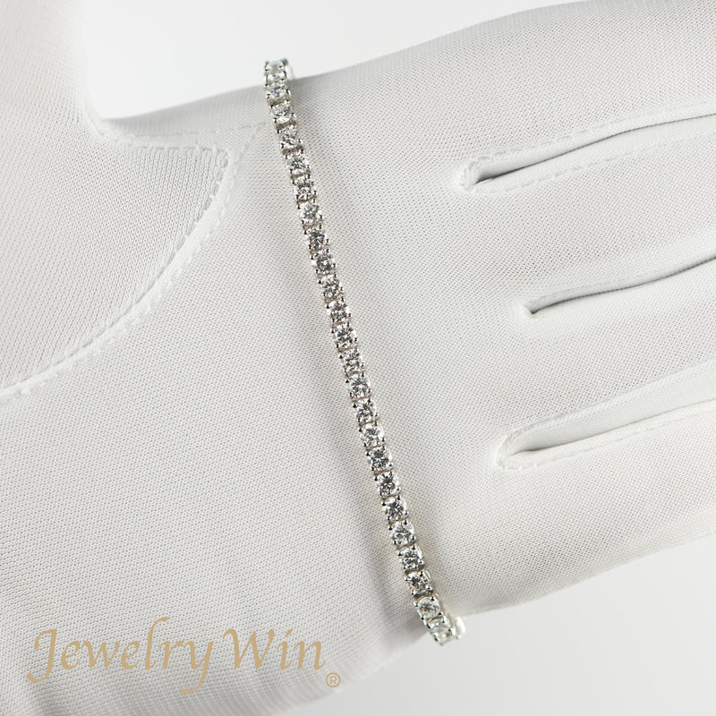 ダイヤモンドテニスブレスレット ストレート Pt900枠 Pt850(金具部分一部) 幅3.4mm 18cm トータル5.00ct カラー:F〜G クラリティ:VS-1〜SI-1 カット:VG〜G ※ダイヤモンドのグレードは目安となります※