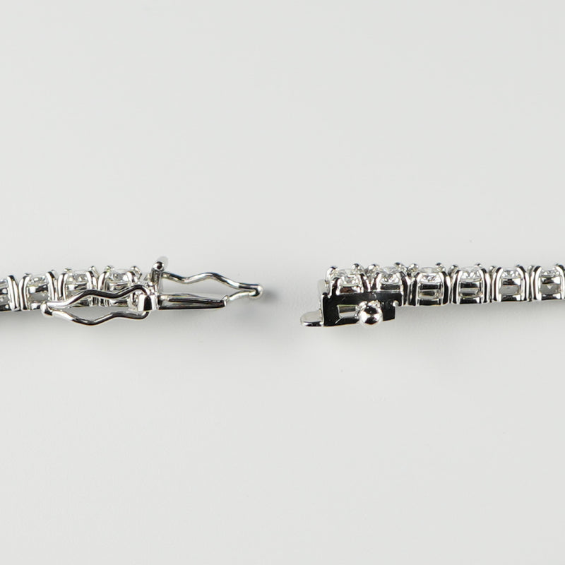 ダイヤモンドテニスブレスレット ストレート Pt900枠 Pt850(金具部分一部) 幅3.4mm 18cm トータル5.00ct カラー:F〜G クラリティ:VS-1〜SI-1 カット:VG〜G ※ダイヤモンドのグレードは目安となります※